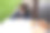 可爱的卷发男孩在户外使用现代笔记本电脑图片下载