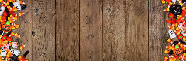 万圣节糖果双面边在一个乡村的木头横幅背景图片下载
