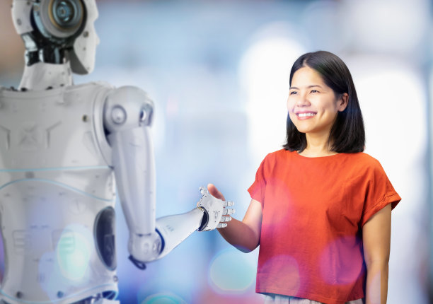 机械人与人类握手图片下载