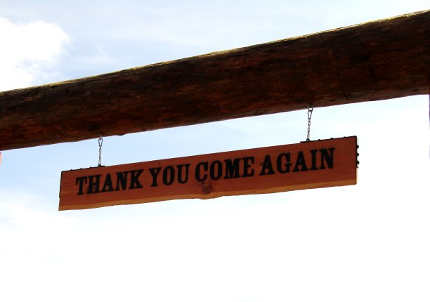 雕刻着“谢谢你再来”的标志图片下载