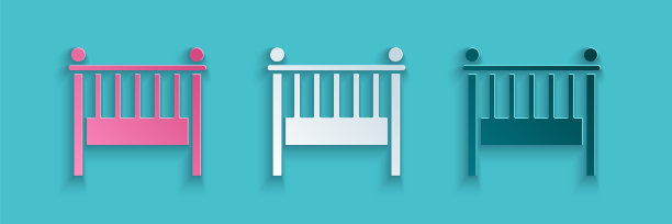 剪纸婴儿床摇篮床图标孤立在蓝色背景。纸艺术风格。矢量图图片下载