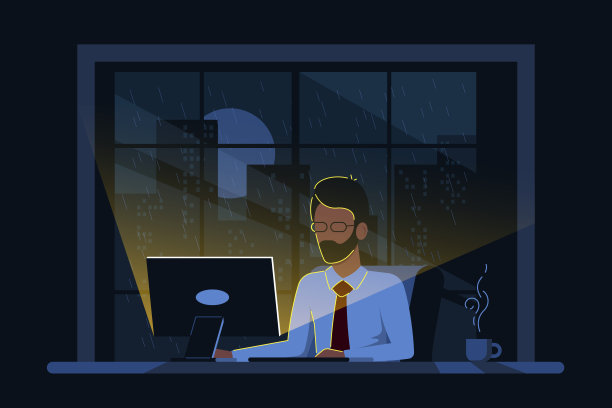 一个白人商人在办公室里用电脑工作图片下载