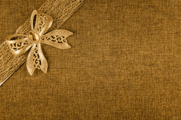 蝴蝶结和缎带上的粗麻布色调的蜂蜜第戎图片下载