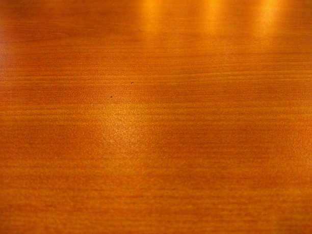 抽象噪声和颗粒梯度暗橙色背景，木质纹理表面图片下载
