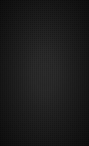 黑色穿孔背景与黑洞和发光图片下载