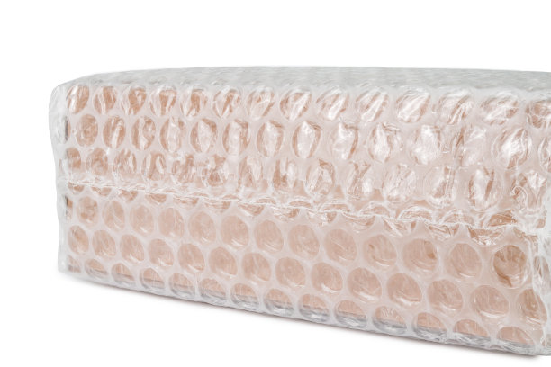 气泡膜包裹的盒子，用于保护运输途中的破损产品或保险图片下载