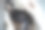 特写，兽医戴着白色医用手套滴耳给诊所里的小黑玩具梗犬图片下载