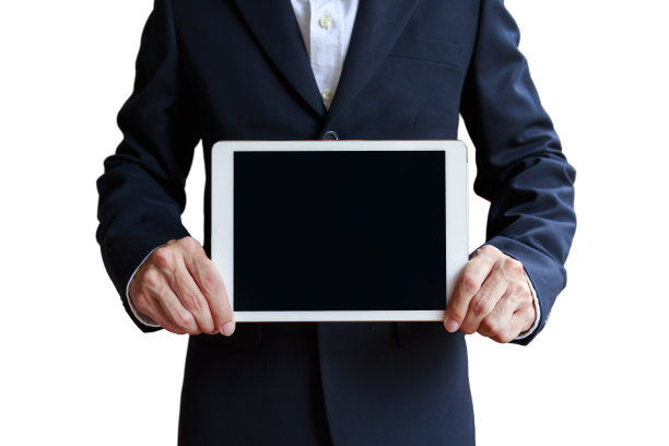 孤立的商人手里拿着数字平板电脑和剪接路径图片下载