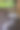 一个美丽的阳台或阳台，一个小桌子，椅子和两个杯子在早晨或傍晚的阳光模糊。图片下载