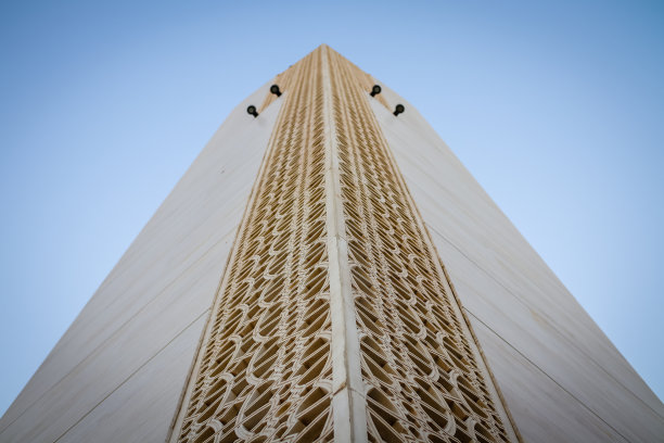 伊斯兰清真寺宣礼塔，日出背景现代设计图片下载