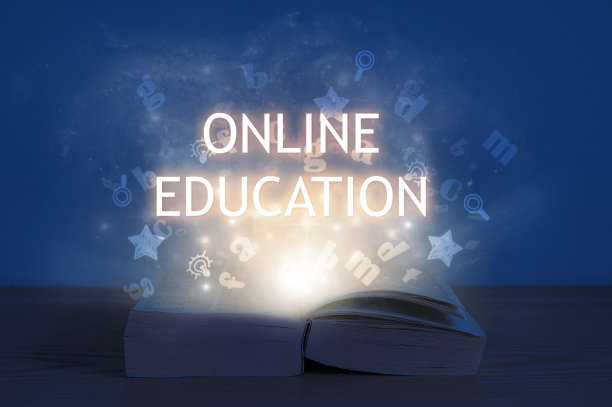 在线教育的概念。光线来自打开的书。开卷带在线教育题词。图片下载