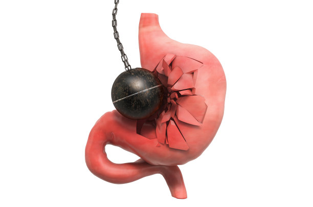 破坏球摧毁人的胃。胃痛、胃病概念。3D渲染孤立的白色背景图片下载