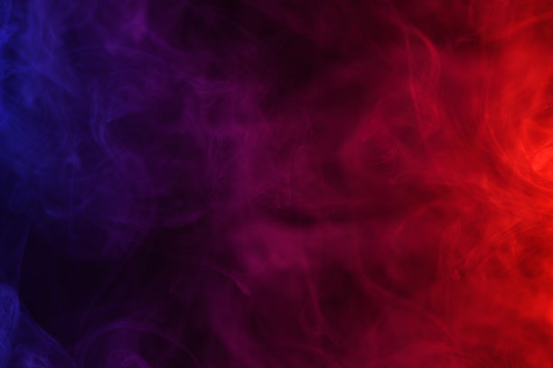彩色烟雾流动的黑色抽象背景图片下载