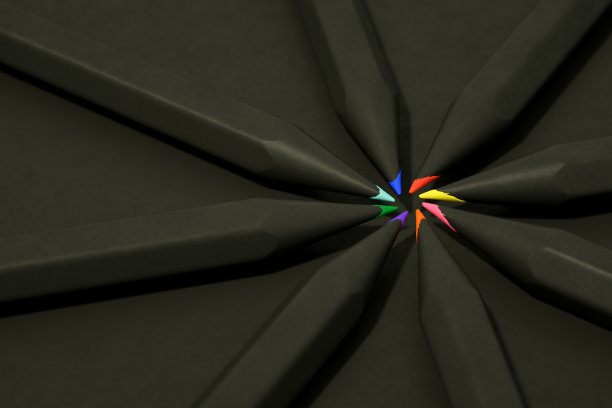 彩色铅笔在黑色背景圆圈组成图片下载