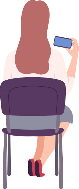 女学生坐在教室后面的椅子上图片下载