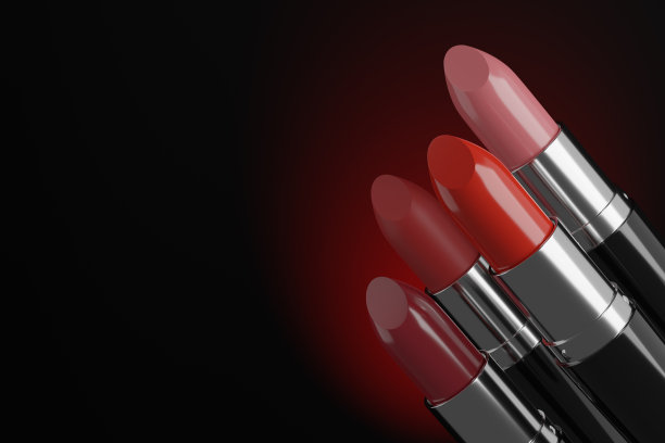 四支口红孤立在黑色背景上。3 d演示。图片下载