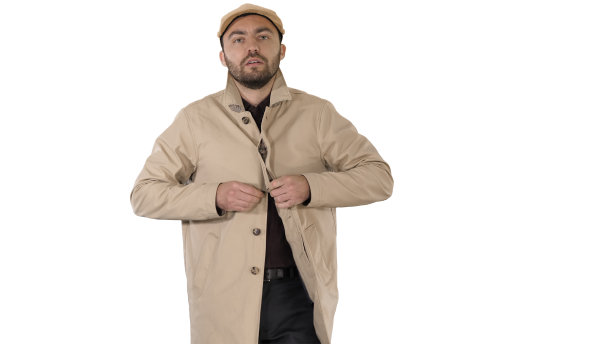 寒冷的天气秋冬的一天穿战壕的男人在白色的背景上扣上扣子图片下载