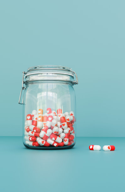 装有心形标志的药丸的罐子，用来对抗社交媒体成瘾图片下载