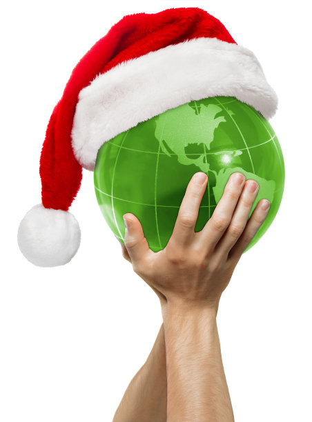 全球圣诞-地球在圣诞老人的帽子在男性手中(北美视图)图片下载