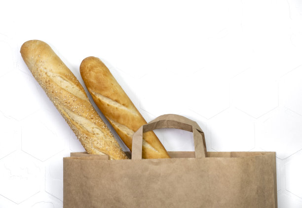 新鲜面包在纸环保袋。图片下载