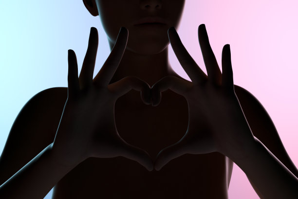 女性手显示心形，霓虹灯图片下载