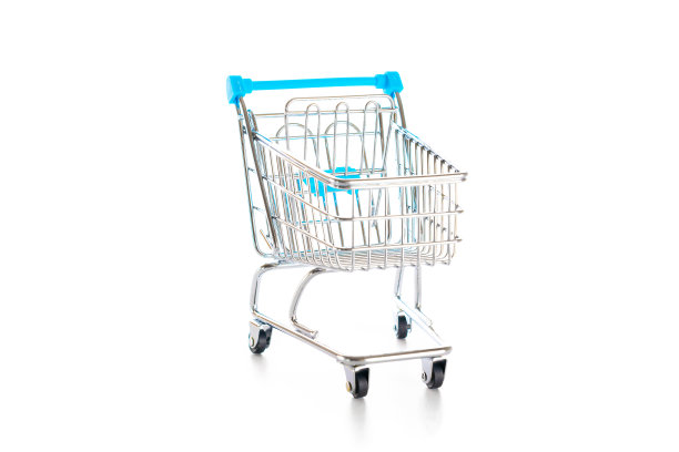 销售旗帜。零售市场的食品购物篮。空手推车超市孤立在白色背景。销售、折扣、购物狂的概念。消费社会的趋势。图片下载