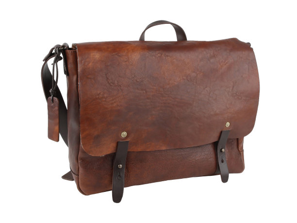 浅棕色皮革的新包。孤立在白色图片下载