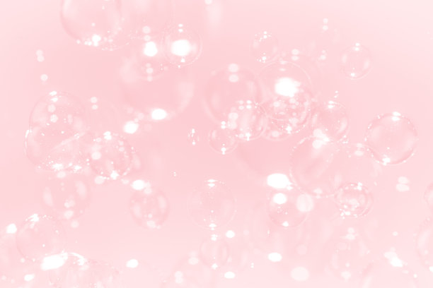 美丽的抽象，新鲜闪亮的粉红色肥皂泡自然背景。图片下载