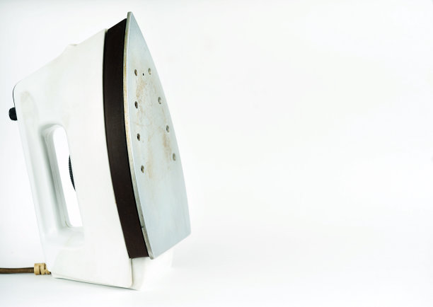 蒸汽熨斗孤立在白色背景上。熨斗家务熨烫电动工具清洁白色背景熨烫蒸汽管家图片下载