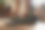 年轻女子在家锻炼后折叠健身垫的手的特写图片下载
