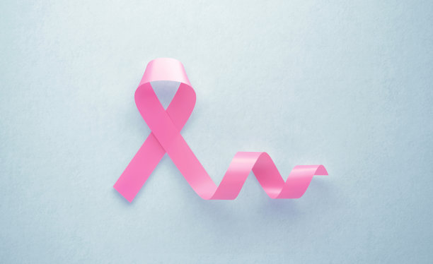 灰色背景上的粉色乳腺癌意识丝带图片下载