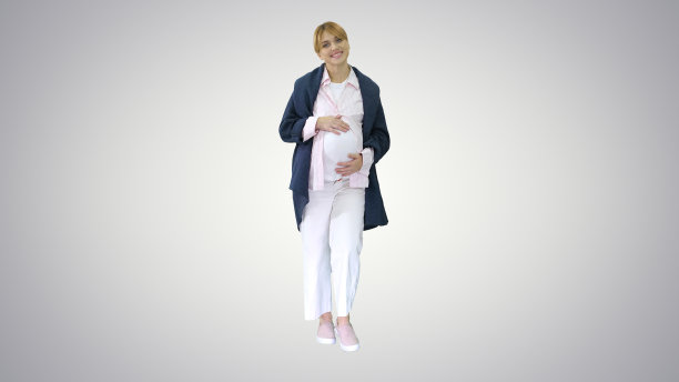 快乐的怀孕金发女士走在梯度背景图片下载