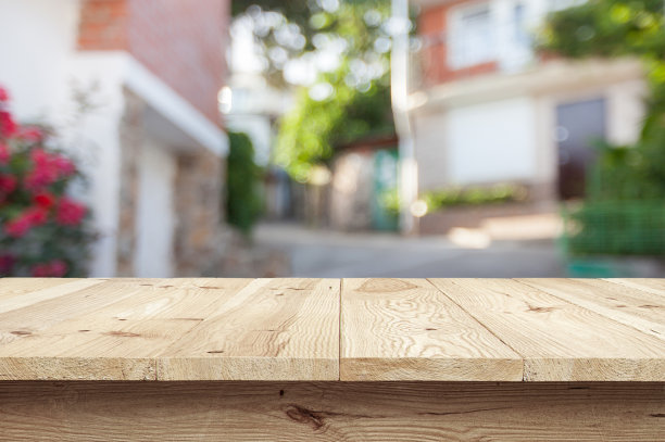 木桌上的散景模糊抽象的自然背景图片下载