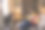 年轻女子坐在家里的沙发-库存照片图片下载