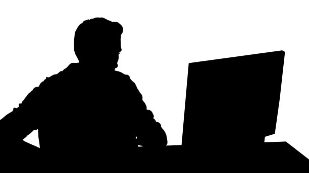 在个人电脑上玩电子游戏的玩家图片下载