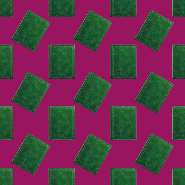 无缝模式的书与封面绿色隔离在樱桃色背景，俯视图特写图片下载