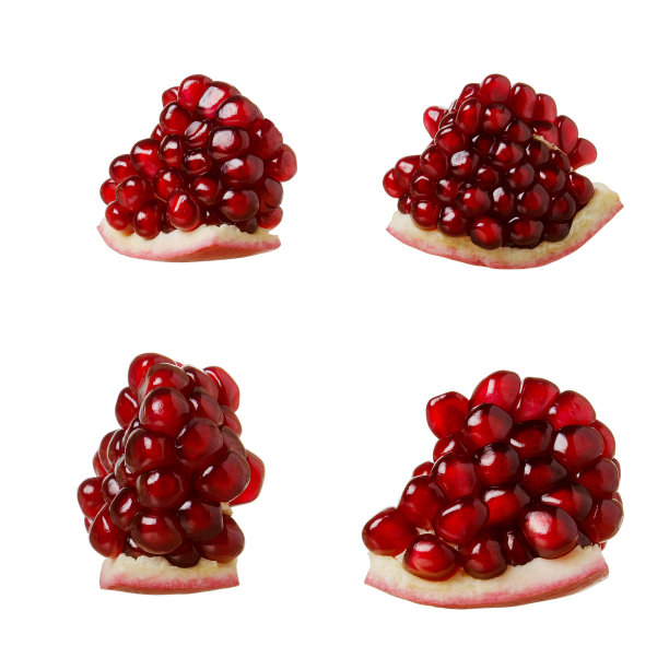 白色背景上孤立的石榴果实，成熟的红色颗粒图片下载