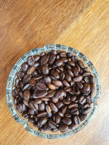 烘焙咖啡豆的背景纹理。开销图片下载