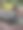 秋天，公园里的花坛旁的长椅，落叶丛中图片下载