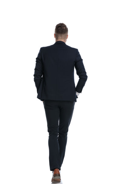 后视图的酷商人走在口袋里的手图片下载