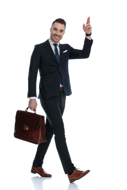 侧面的正面商人问候和拿着公文包图片下载