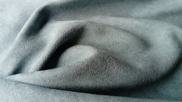 灰色和蓝色窗帘的天鹅绒织物特写图片下载