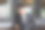 亚洲商人，黑色西装，短发，英俊潇洒，使用手机图片下载