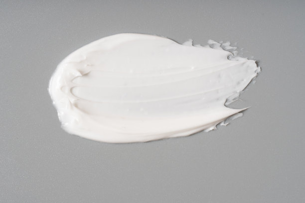 白色化妆面霜纹理上的白色背景图片下载