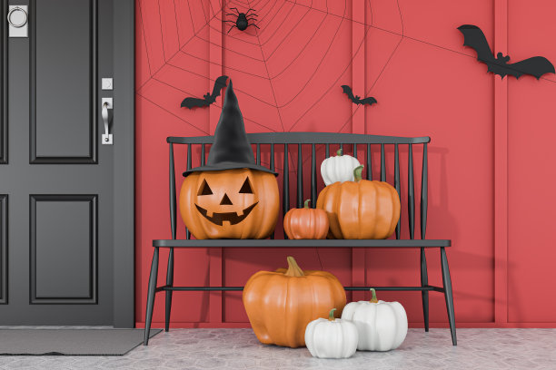 在红房子附近的长凳上雕刻南瓜图片下载