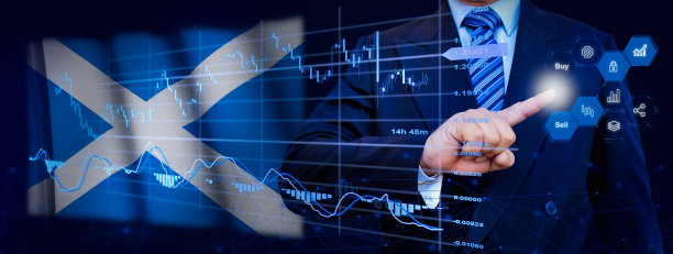 商人触摸数据分析处理系统，具有KPI财务图表，股票仪表盘和营销虚拟界面。背景是苏格兰国旗。图片下载