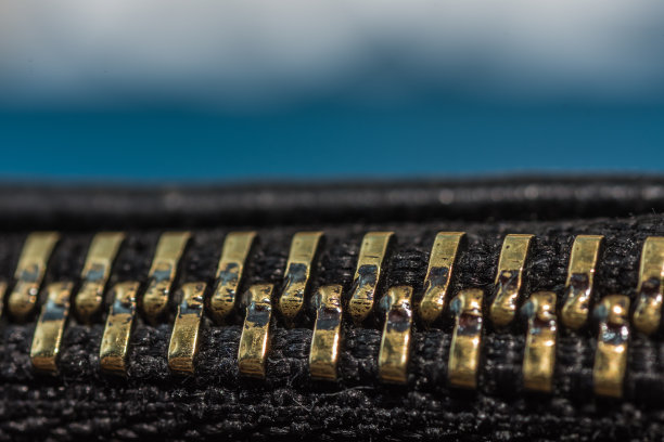 拉链细节视图与蓝色背景图片下载