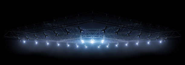 舞台上的灯光设备。蓝色的光。聚光灯照亮了舞台、场景、讲台。明亮的灯光和聚光灯。黑色孤立光图片下载