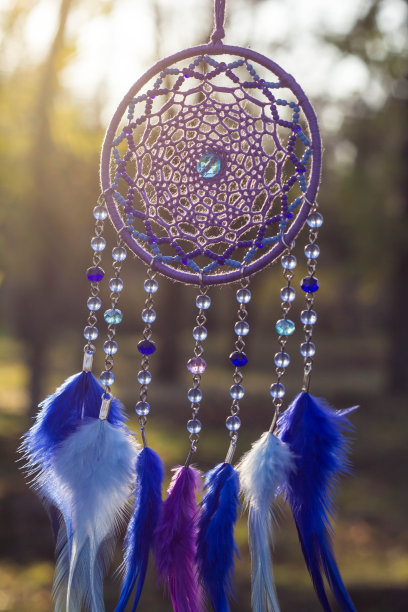 手工捕梦网，用羽毛、线和珠子绳挂图片下载