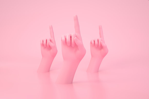 女性手指向上，粉红色背景图片下载